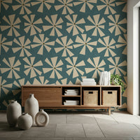 Patterned wallpaper featuring stylized starburst flowers in a playful abstract arrangement.