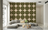 Circles in linen wallpaper featuring large olive-brown textured circles on a soft beige background