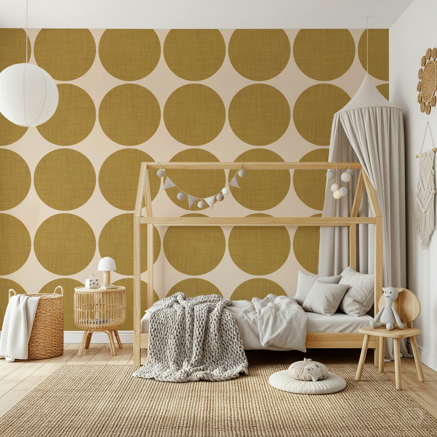 Repeating pattern of textured ochre round shapes on a warm neutral backdrop