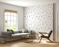 Minimalist wallpaper with hand-drawn wildflower sketches scattered evenly across a light neutral surface