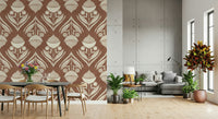 Terracotta floral wallpaper with symmetrical folk-style botanical illustrations in cream