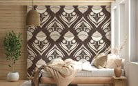 Decorative wallpaper mural with symmetrical floral shapes and earthy geometric detailing.