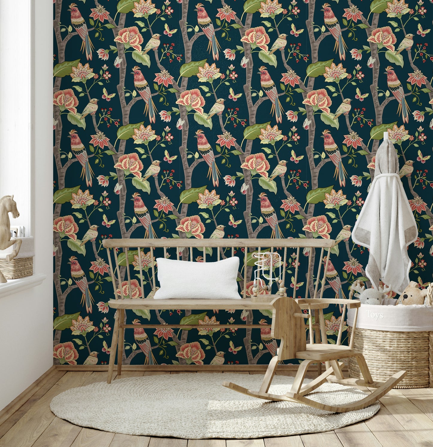 Nature-inspired wallpaper mural with detailed birds, lush green leaves, and pink floral clusters.