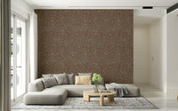 Textured wallpaper mural featuring radiating organic shapes that evoke falling autumn leaves.