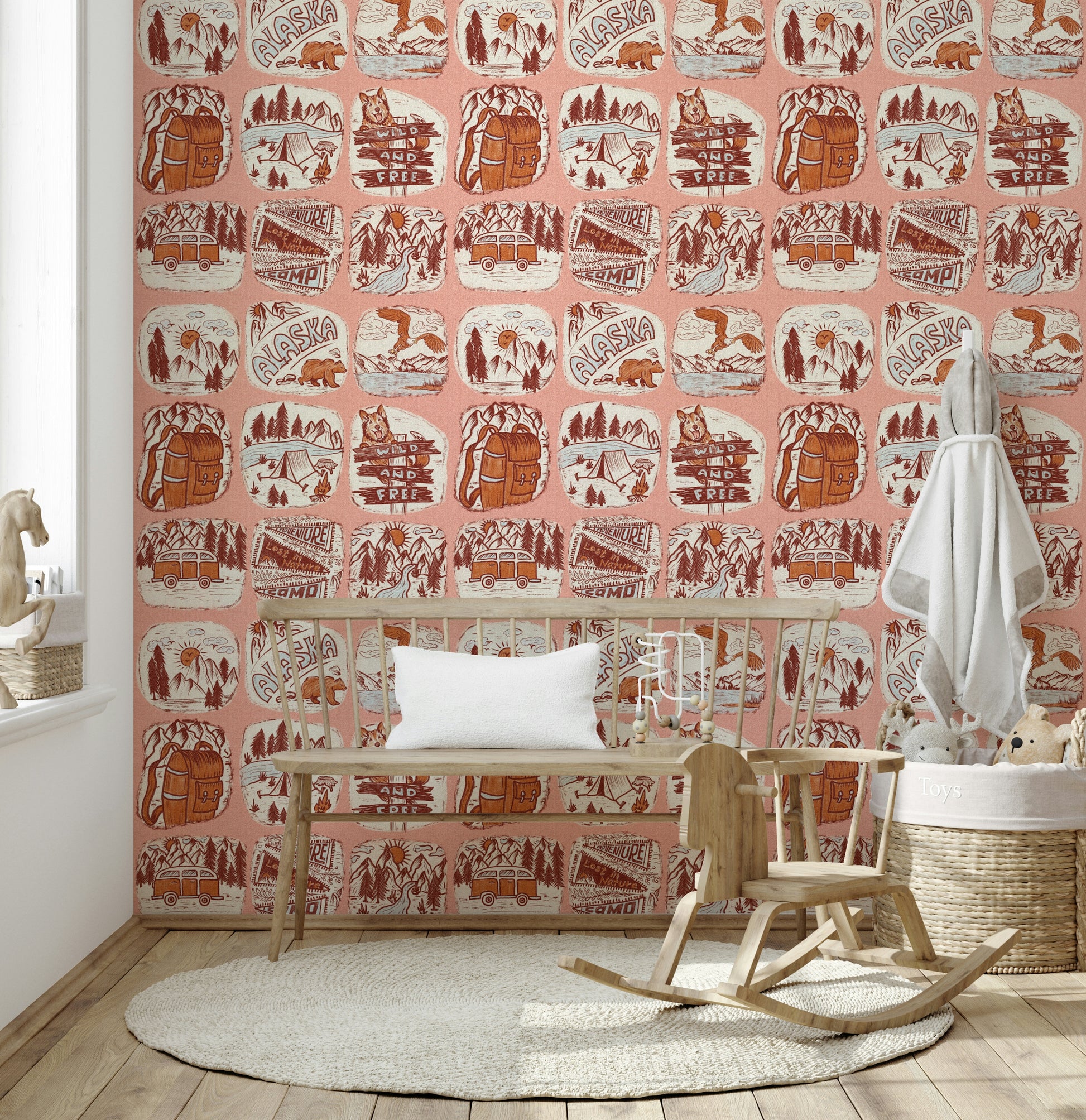 Camping-themed wallpaper mural with sketch-style patches of Alaska scenery, bears, eagles, and vans.