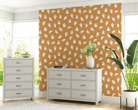 Soft, friendly ghost figures floating across a minimal spooky design.