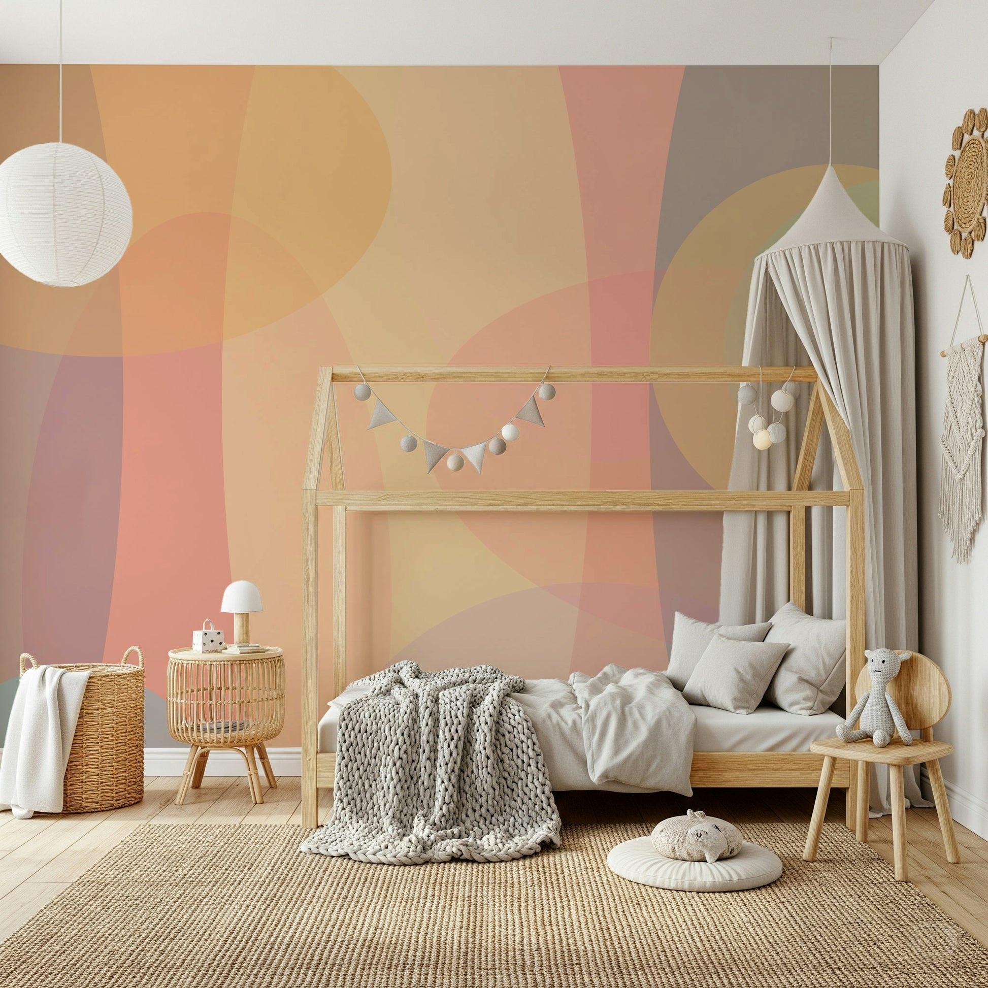 Blended ovals in beige, coral, and muted greens creating a peaceful abstract wallpaper pattern.