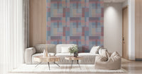 A repeating wallpaper pattern of soft rectangles in blended shades of blue, pink, and beige.