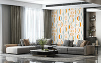 Colorful retro wallpaper with elongated oval shapes and dotted curved lines in a mid-century palette.