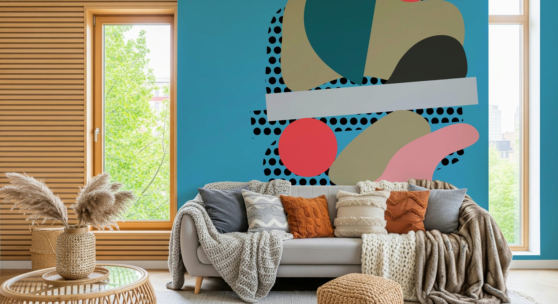 An abstract wallpaper with soft-edged shapes, bold circles, and dotted black accents on a vibrant blue.
