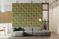 Retro-inspired wallpaper with a grid of soft-toned squares and expressive eye graphics repeating throughout.