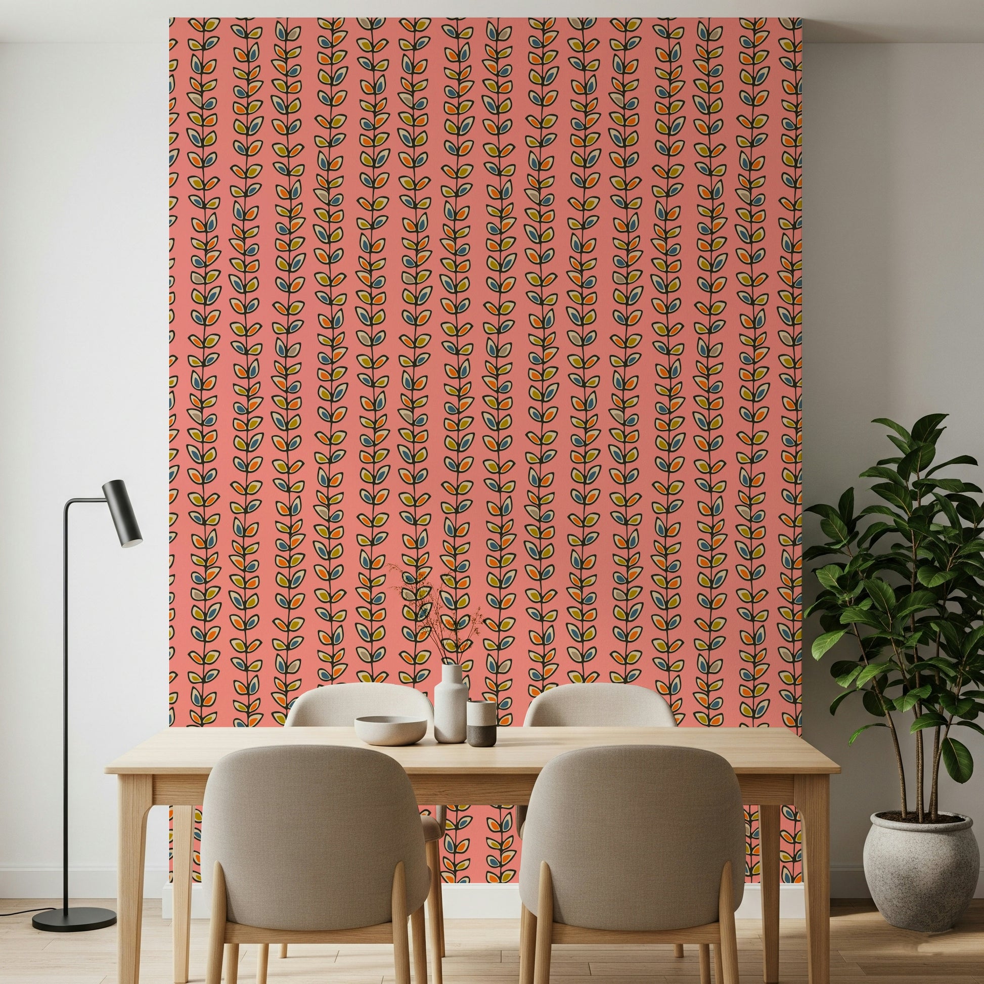 A patterned wallpaper featuring colorful leaf clusters rising in vertical rows against a pink backdrop.