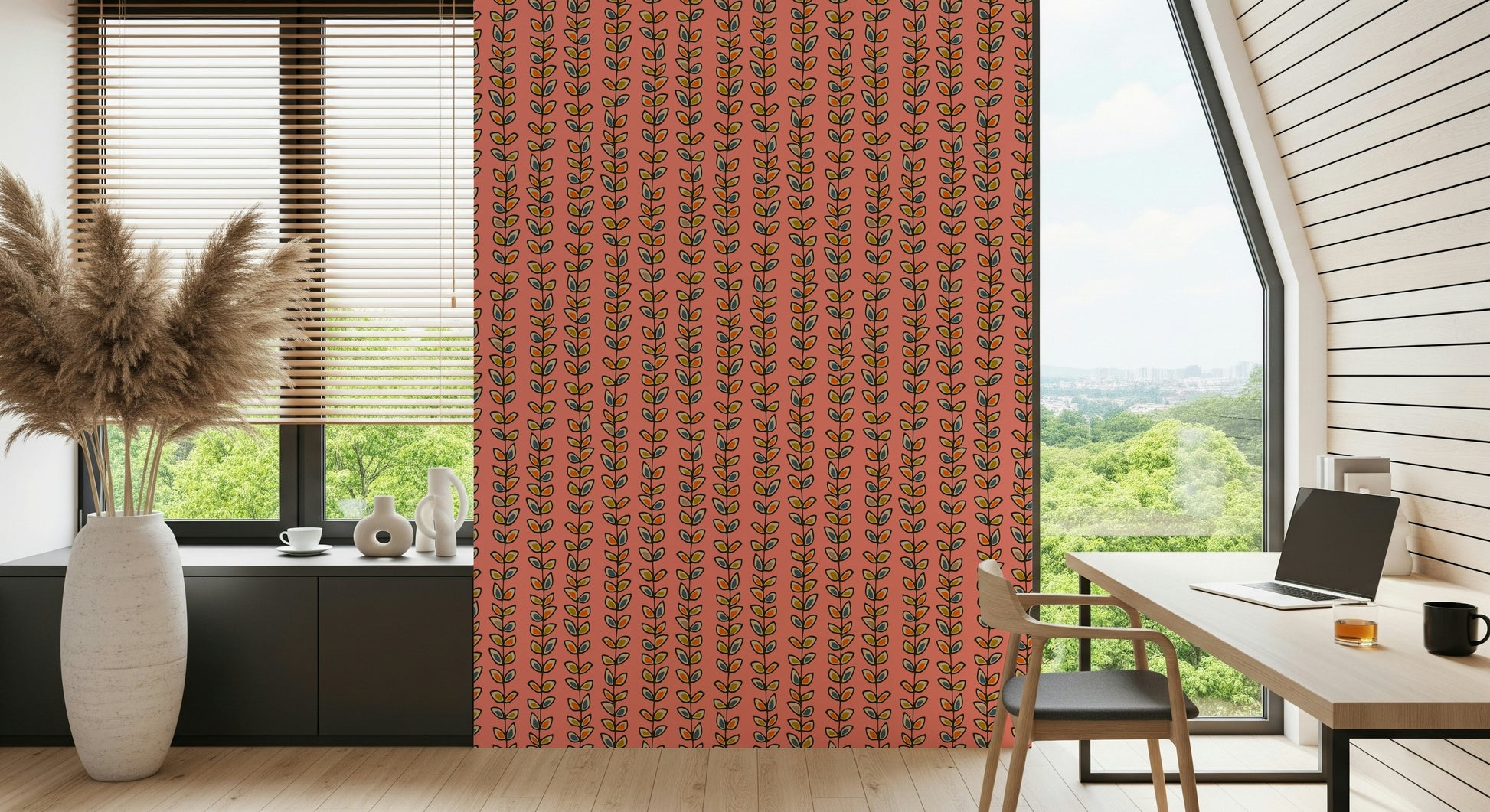 Stylized retro leaves in cheerful tones forming repeating vine stripes on a warm pink wallpaper.