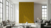 A nostalgic wallpaper featuring multicolored retro leaves arranged on neat mustard vine patterns.