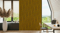 Vertical retro vine stripes filled with colorful leaf designs for a cheerful mustard yellow wallpaper look.