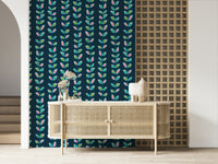A patterned retro wallpaper with evenly spaced vertical vines and bright stylized leaves on dark blue.