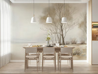 Bare-branched trees rising from a frosty shoreline in a subtle winter landscape wallpaper.