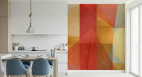A vibrant geometric wallpaper featuring overlapping urban shapes in warm red, orange, and yellow tones.