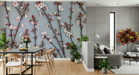 A delicate wallpaper showcasing cherry plant stems adorned with blooming flowers in gentle pastel tones.