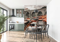 Moored Rowing Boat mural, historic riverside view, moody sky color palette.