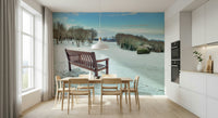 Vibrant winter forest mural, brown bench, calm Snowy Landscape wallpaper.