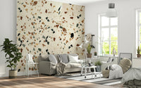 Earthy mineral aggregate wallpaper for a refreshing stone look.