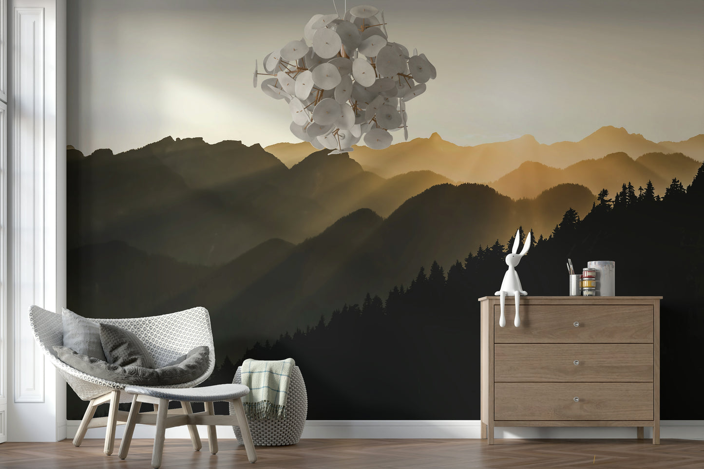 Dramatic wall mural illustrating golden sunrise over forested mountain ridges.