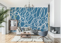 Abstract pattern Sapphire blue background with playful, looping white lines.