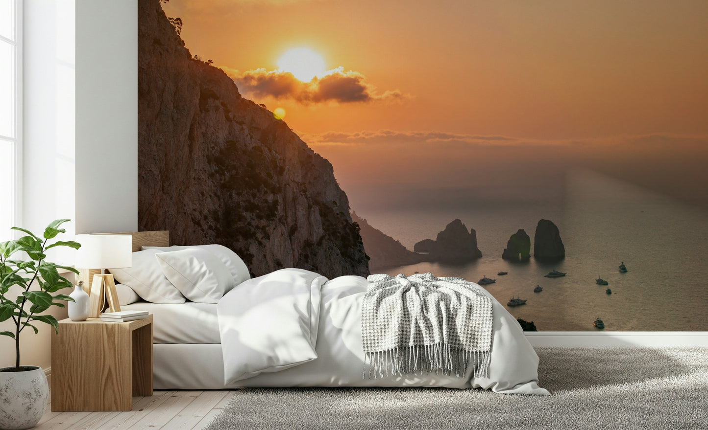Golden light Sunrise Cliffs peel and stick wallpaper; nautical boats below cliff.