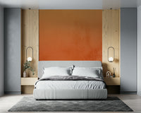 Vibrant tangerine orange wall mural featuring a rustic patina finish.