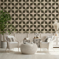 Curved geometric wallpaper, featuring interlocking petals and stars.
