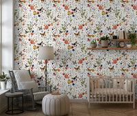 Whimsical Meadow Magic wall mural with watercolor flowers and berries.
