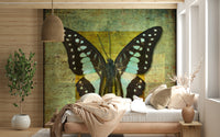 Artistic Gilded Butterfly wall mural incorporating old manuscript handwriting visuals