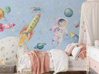Watercolor Space Adventure wall mural in a Nursery badroom