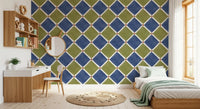 Deep blue olive wallpaper bringing a calming geometric focal point to a master bedroom.