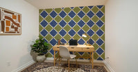Vintage tile pattern wallpaper complementing the fixtures in a bright home office.