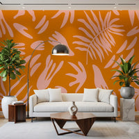 Bloom wall mural with abstract foliage and warm color palette