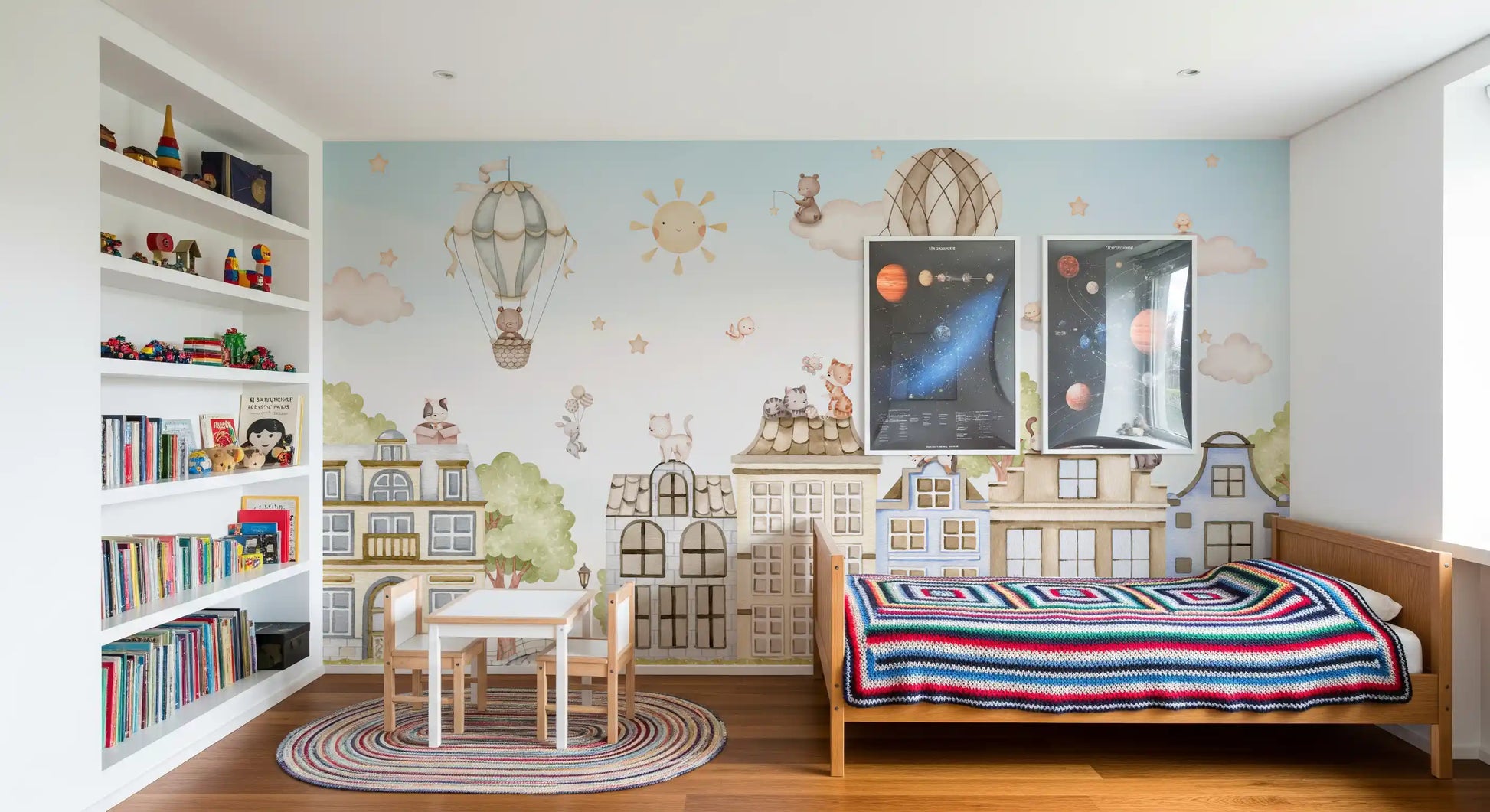 Pastel city wall mural with cats, buildings, and sky elements