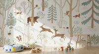 Forest animal wall mural with squirrels, deer, and leafy branches on light backdrop