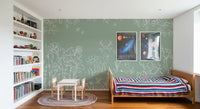 Green floral wall mural featuring deer, mice, and delicate botanical outlines