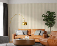 Living room decor with muted candy stripe wallpaper and soft canvas texture