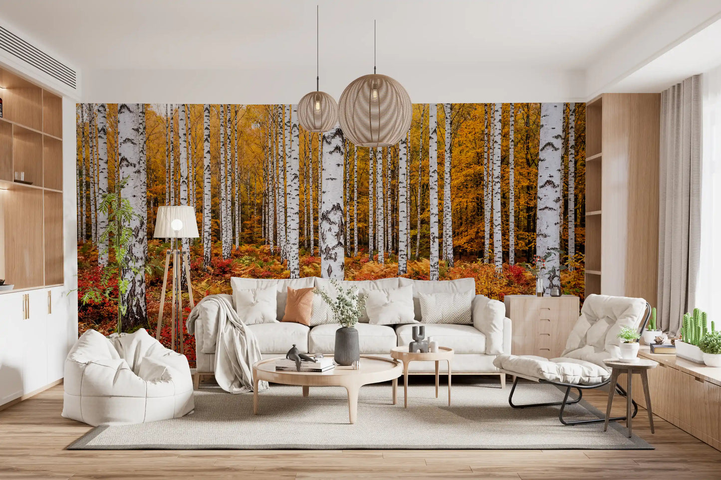 Living area wall mural showing golden autumn birches and bright forest floor tones