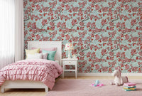 Bedroom wall featuring Cherry Blossom on Sea Glass wallpaper with florals