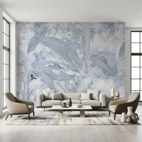 Living room styled with Misty Blue Tropical Palm wall mural in soft tones