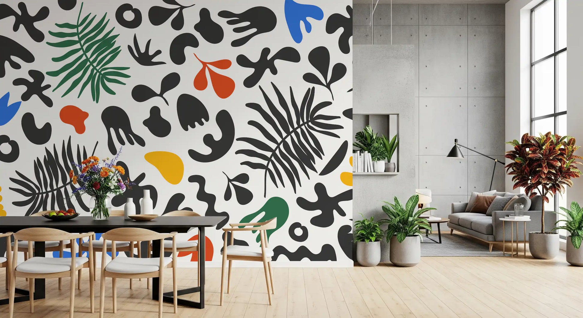 Dining area featuring Vibrant Shapes wall mural with tropical fronds and cutout motifs