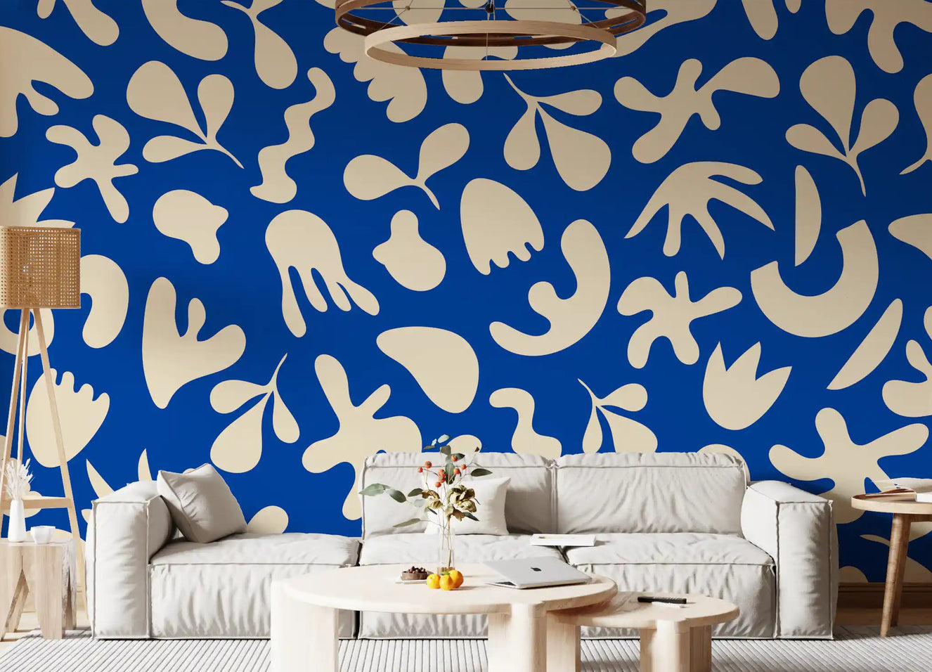 Living room with Blue Organic Flow wall mural in cream abstract cutout shapes