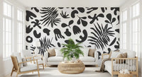 Black and White mural with bold organic leaf pattern across the wall