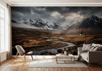 Valley river wall mural with dramatic sky and snow-covered mountains