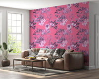Living room design uses Fuchsia floral wallpaper with garden print artwork