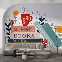 Stacked books, red mug, and mushrooms drawn into So Many Books So Little Time wall mural